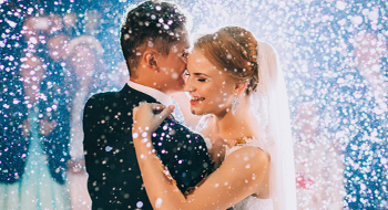 a bride and groom dance at their wedding
