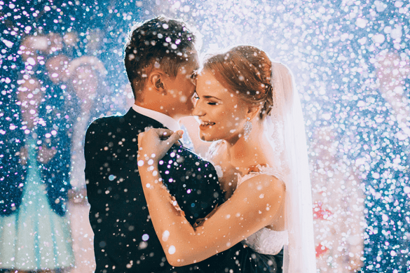 a bride and groom dance on their wedding day